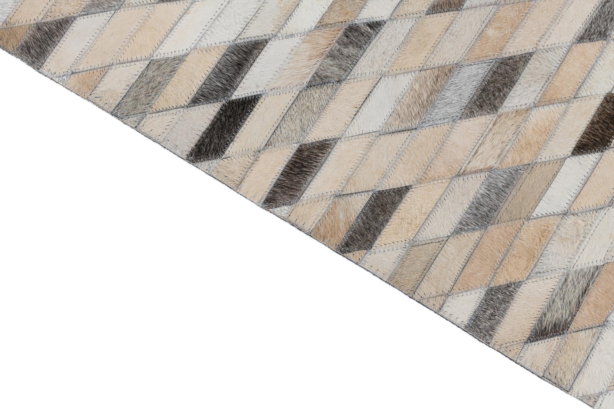 5' 1 x 7' 10 Cowhide Leather Rug