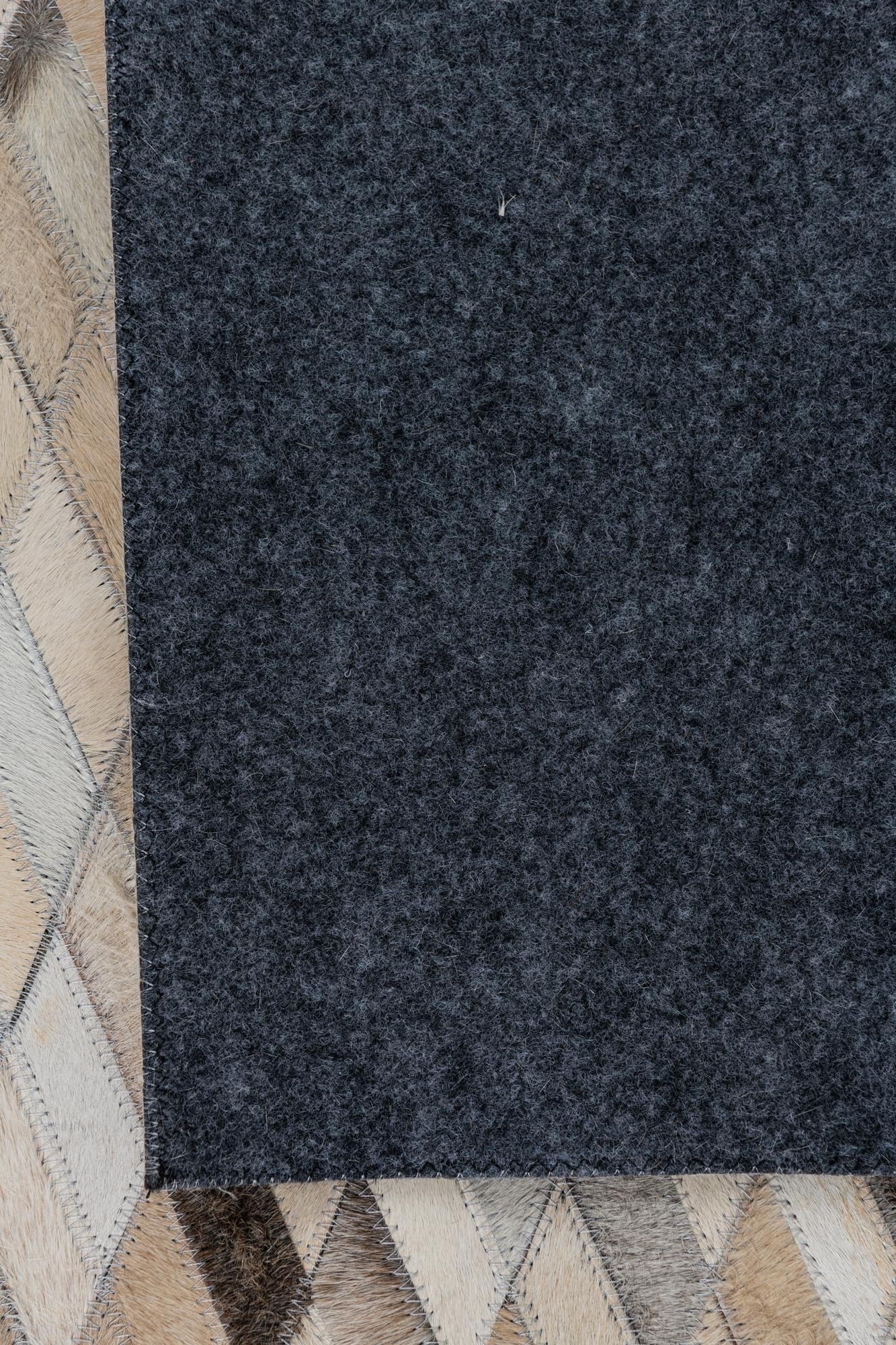 5' 1 x 7' 10 Cowhide Leather Rug