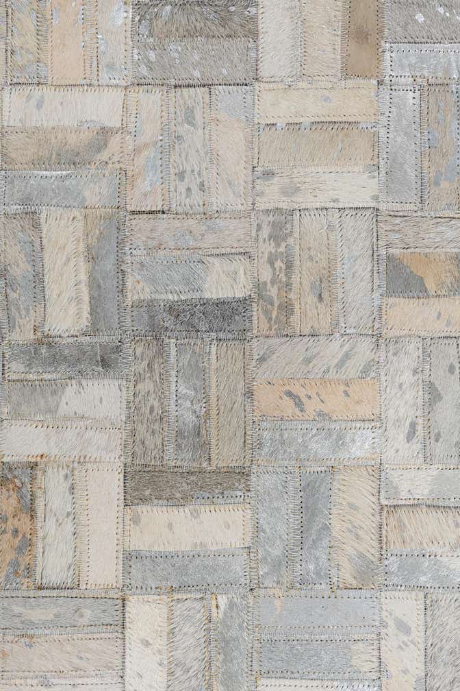 5' 1 x 7' 10 Cowhide Leather Rug