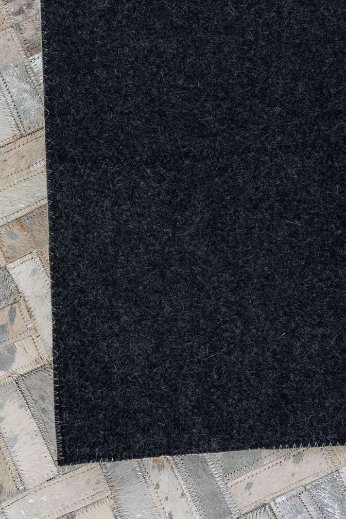 5' 1 x 7' 10 Cowhide Leather Rug