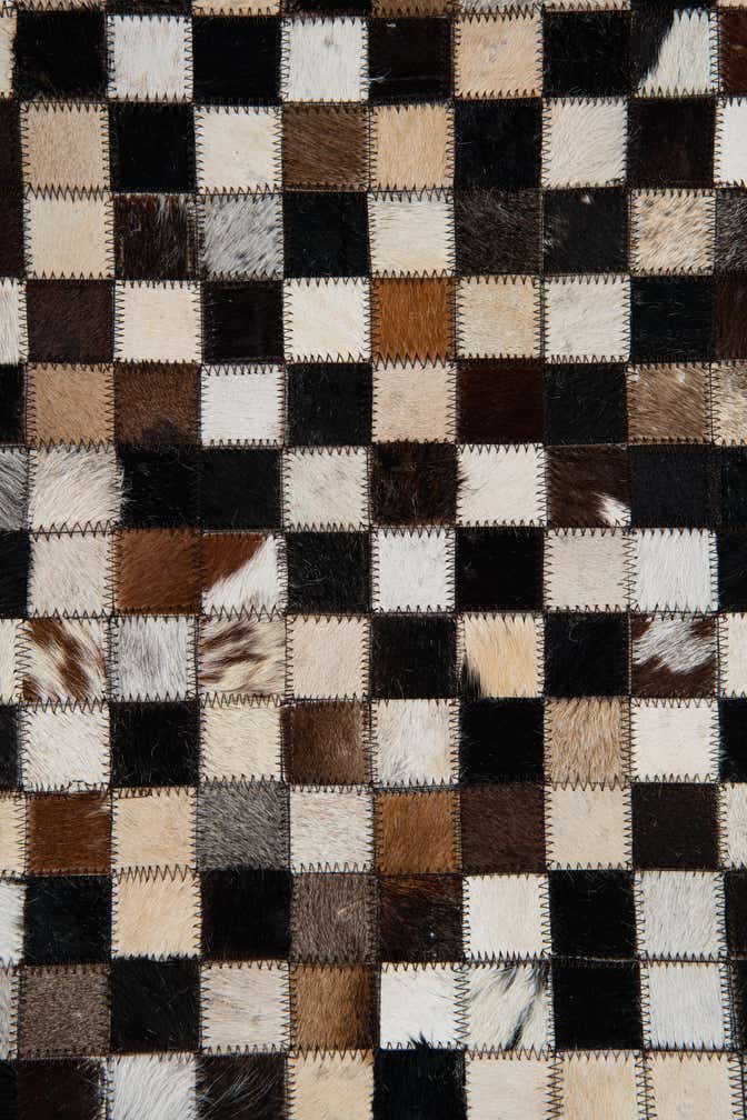 5' 1 x 8' 1 Cowhide Leather Rug