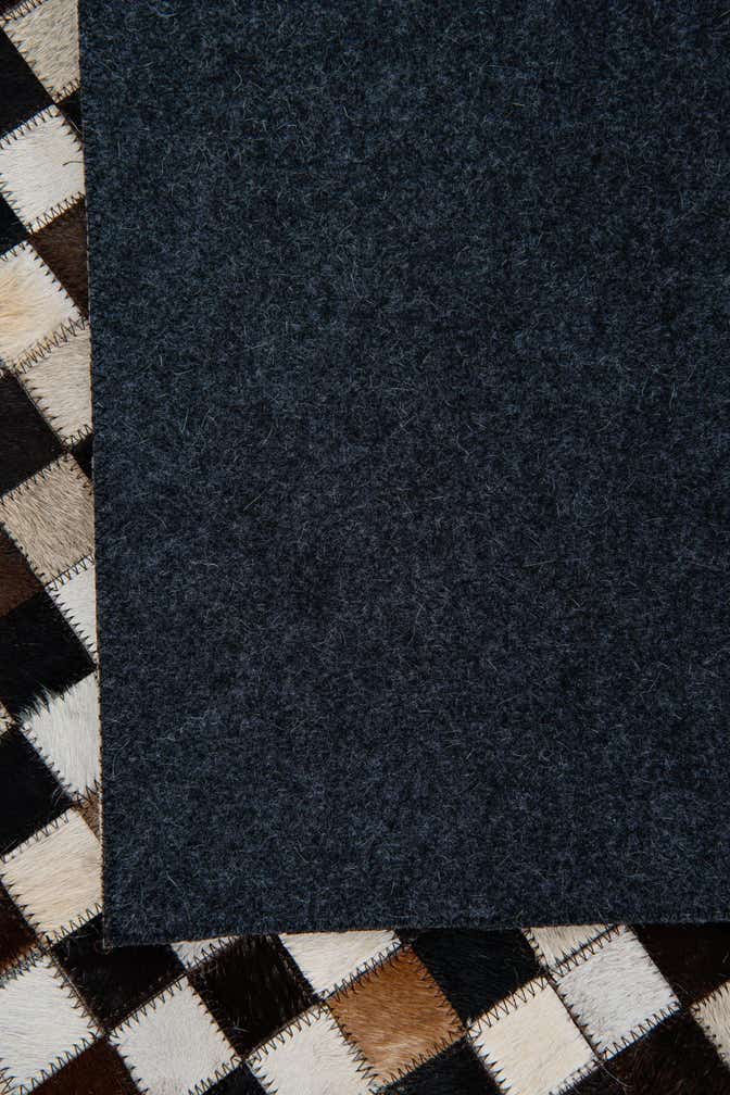5' 1 x 8' 1 Cowhide Leather Rug