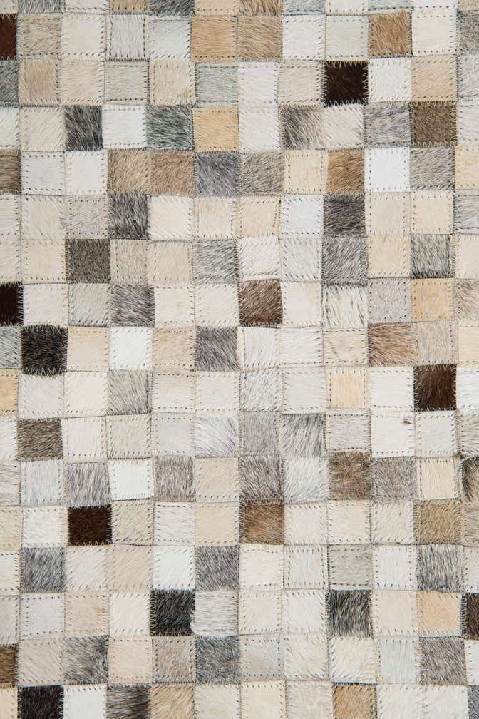 5' 2 x 7' 10 Cowhide Leather Rug