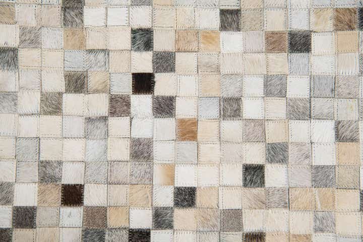 5' 2 x 7' 10 Cowhide Leather Rug