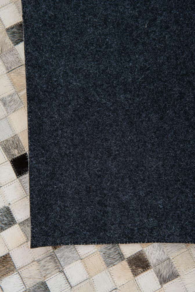 5' 2 x 7' 10 Cowhide Leather Rug