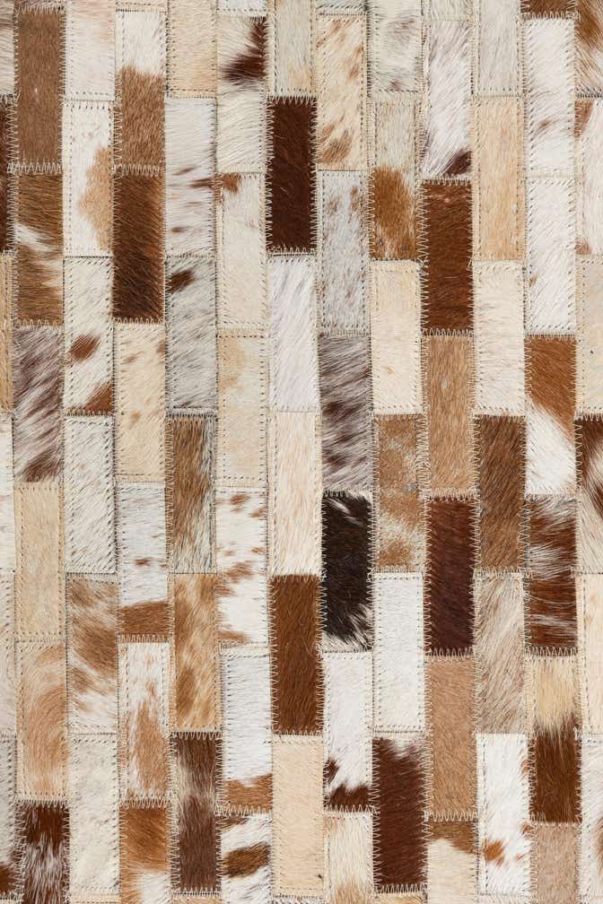 8' 1 x 9' 10 Cowhide Leather Rug