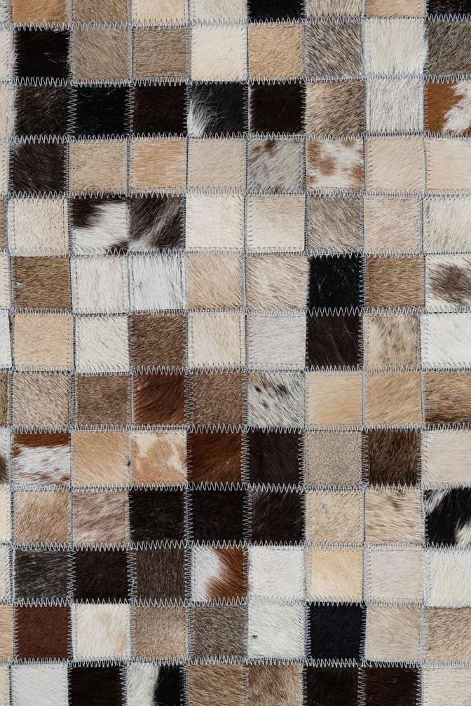 5' 2 x 7' 10 Cowhide Leather Rug