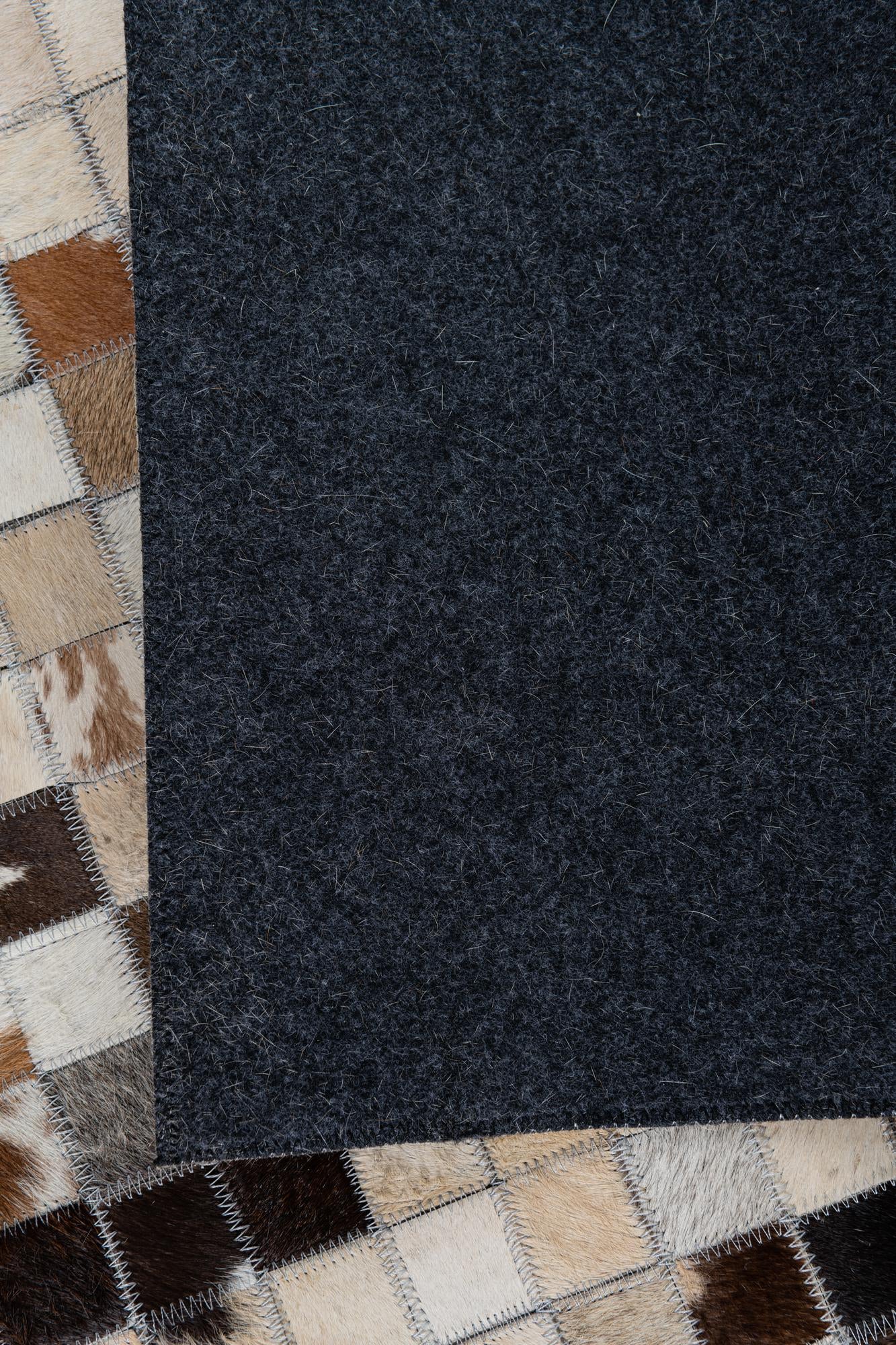 5' 2 x 7' 10 Cowhide Leather Rug