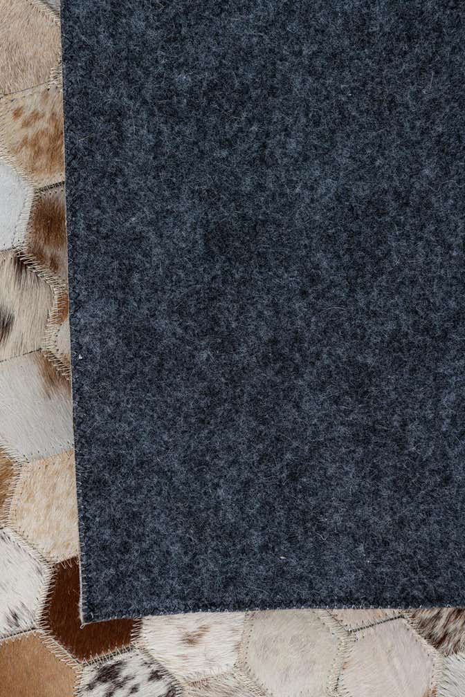 5' 1 x 7' 10 Cowhide Leather Rug