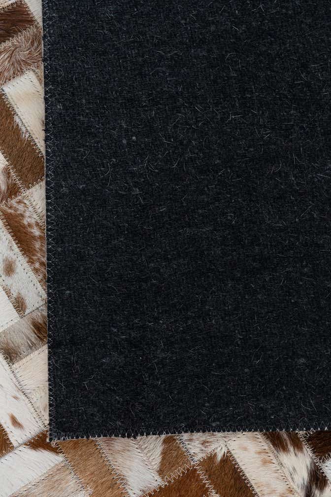 4' 10 x 7' 9 Cowhide Leather Rug