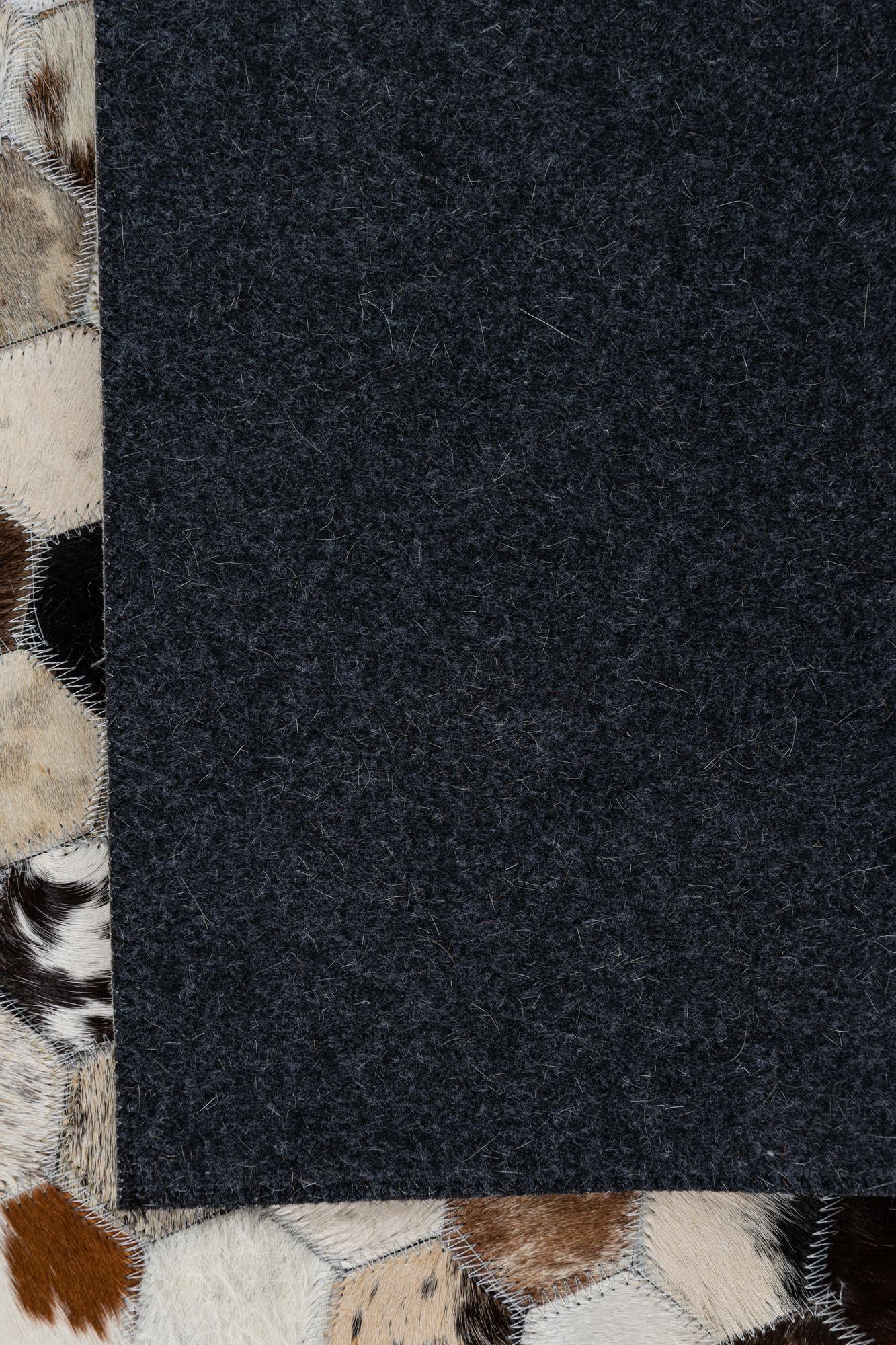 5' x 7' 9 Cowhide Leather Rug