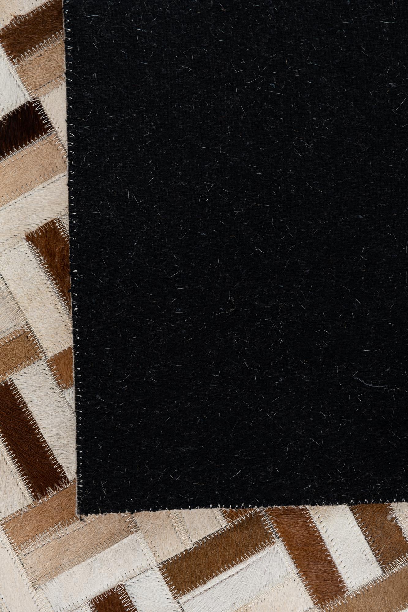 5' 1 x 7' 10 Cowhide Leather Rug