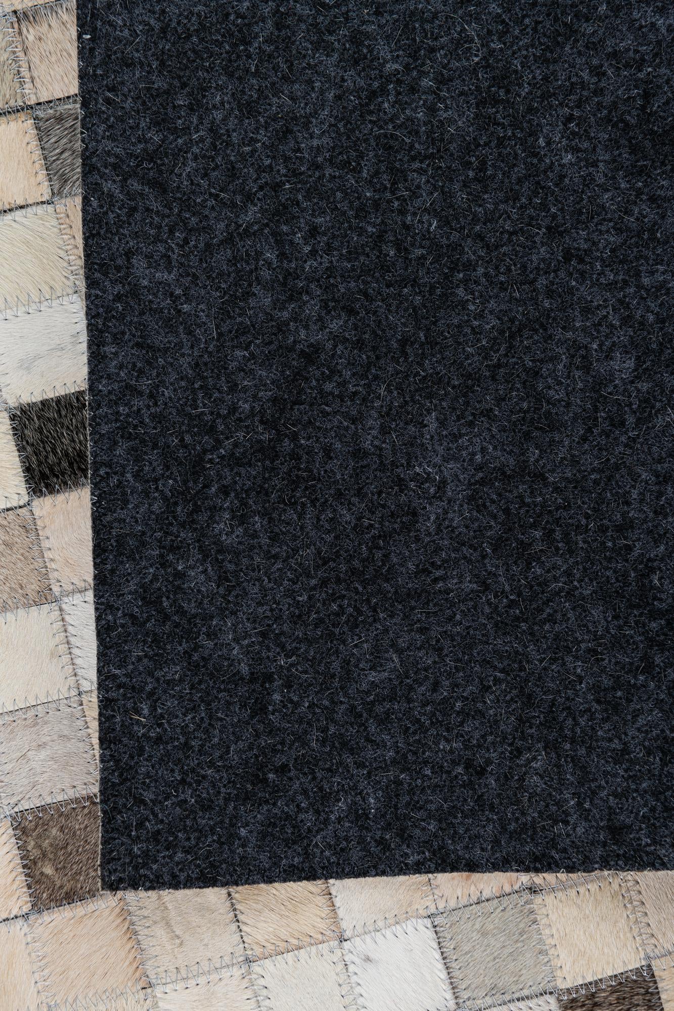5' 1 x 7' 10 Cowhide Leather Rug