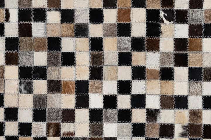 5' 1 x 7' 10 Cowhide Leather Rug