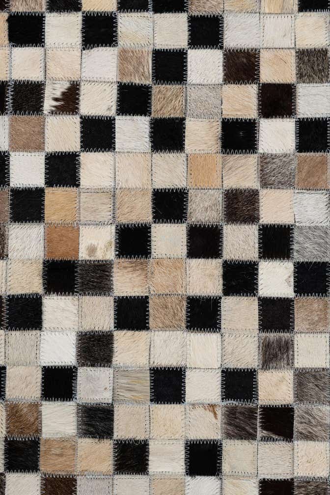 5' 1 x 7' 10 Cowhide Leather Rug