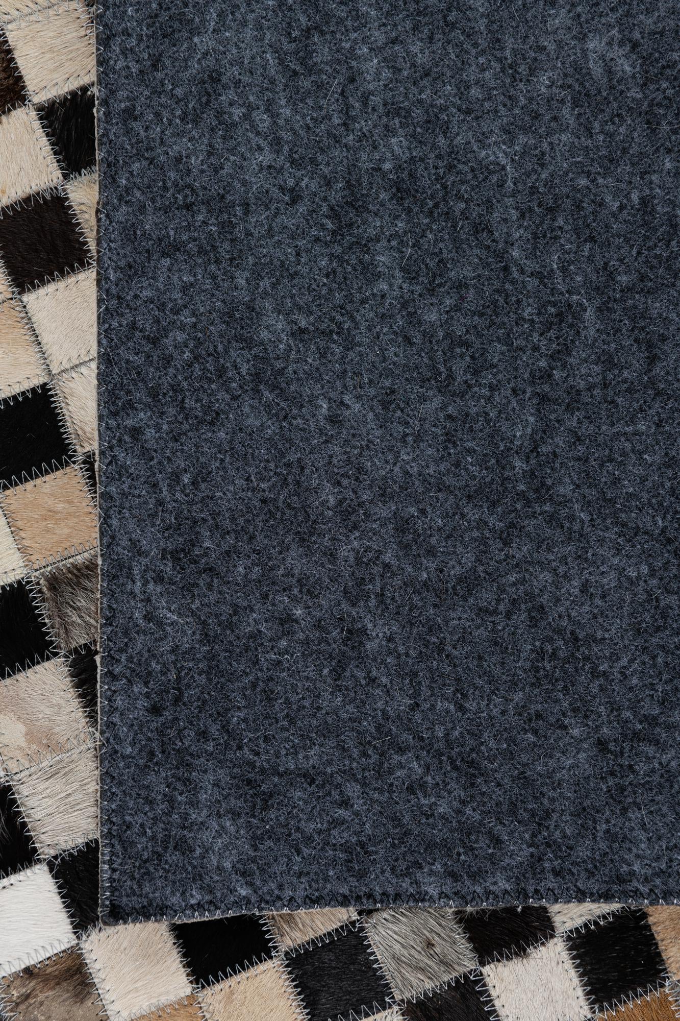 5' 1 x 7' 10 Cowhide Leather Rug