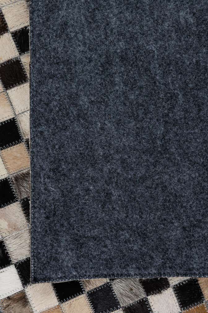 5' 1 x 7' 10 Cowhide Leather Rug