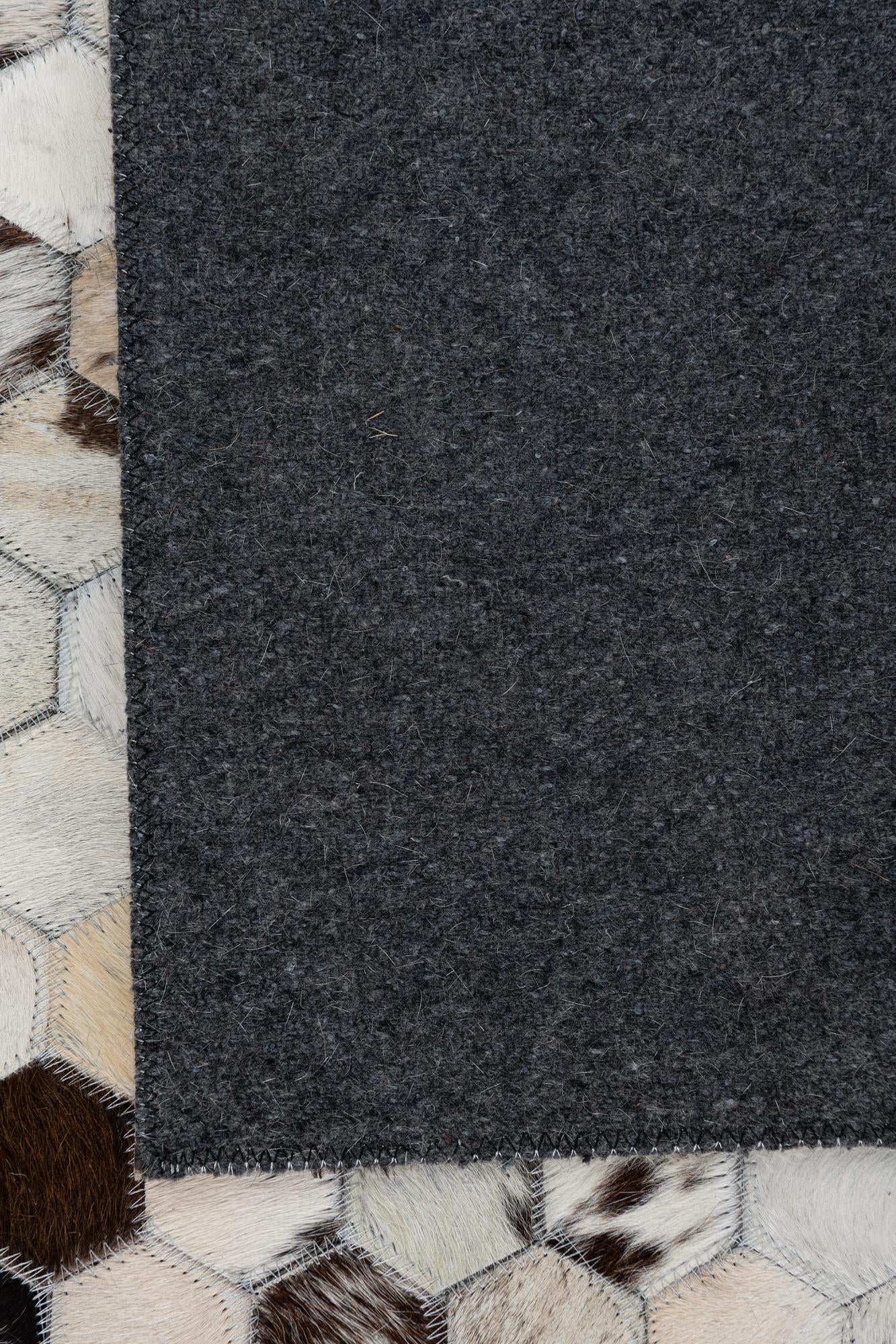 5' 1 x 8' 2 Cowhide Leather Rug