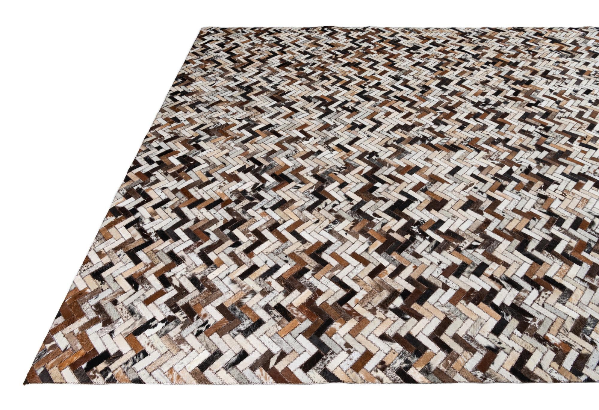 8' 1 x 9' 10 Cowhide Leather Rug