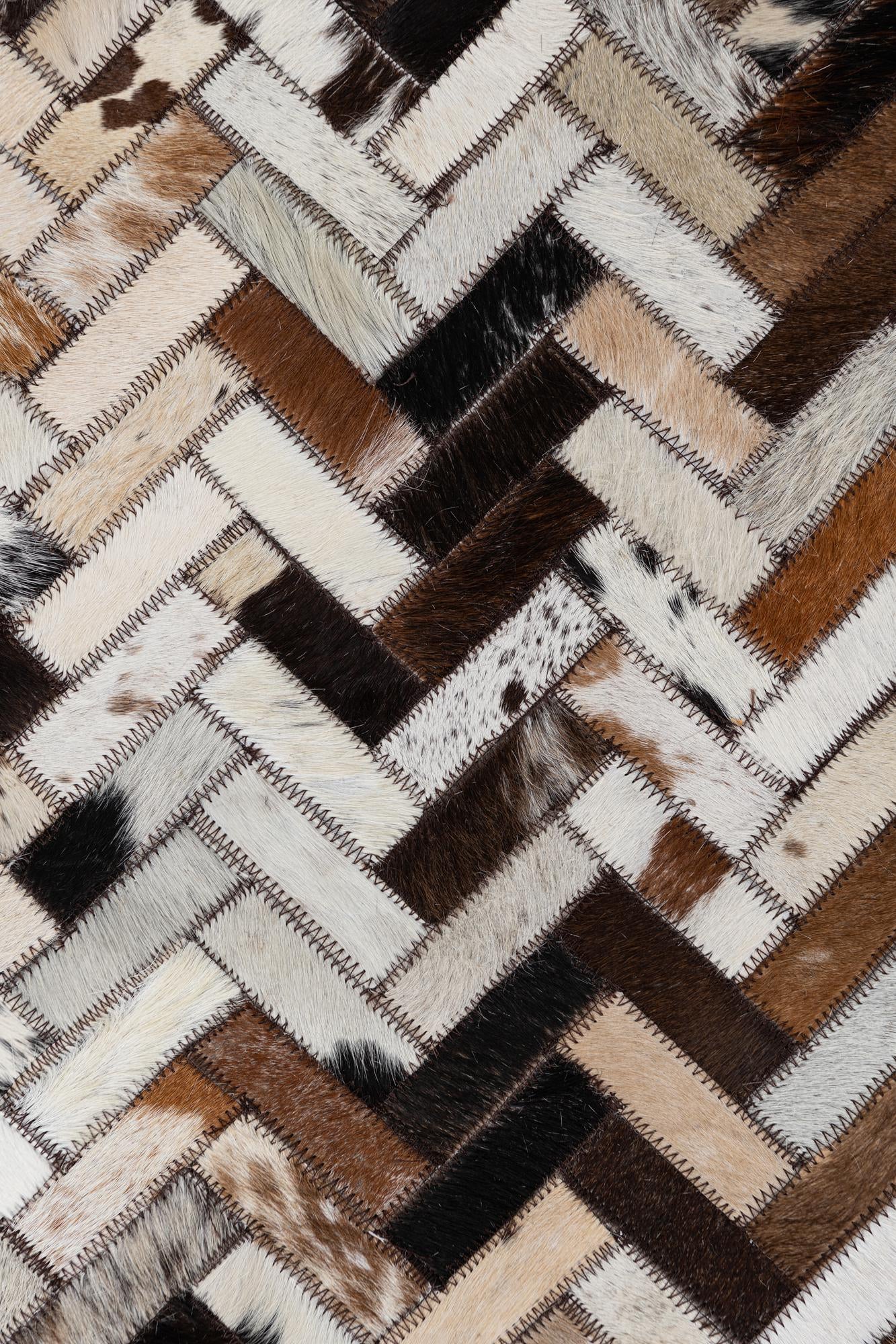 8' 1 x 9' 10 Cowhide Leather Rug