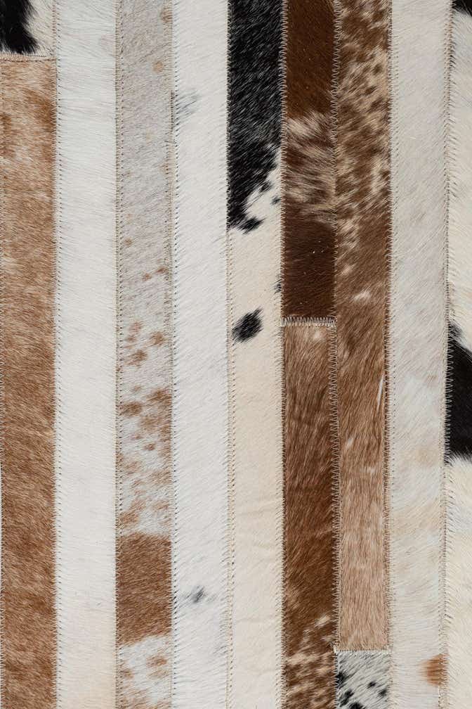 8' 1 x 10' Cowhide Leather Rug