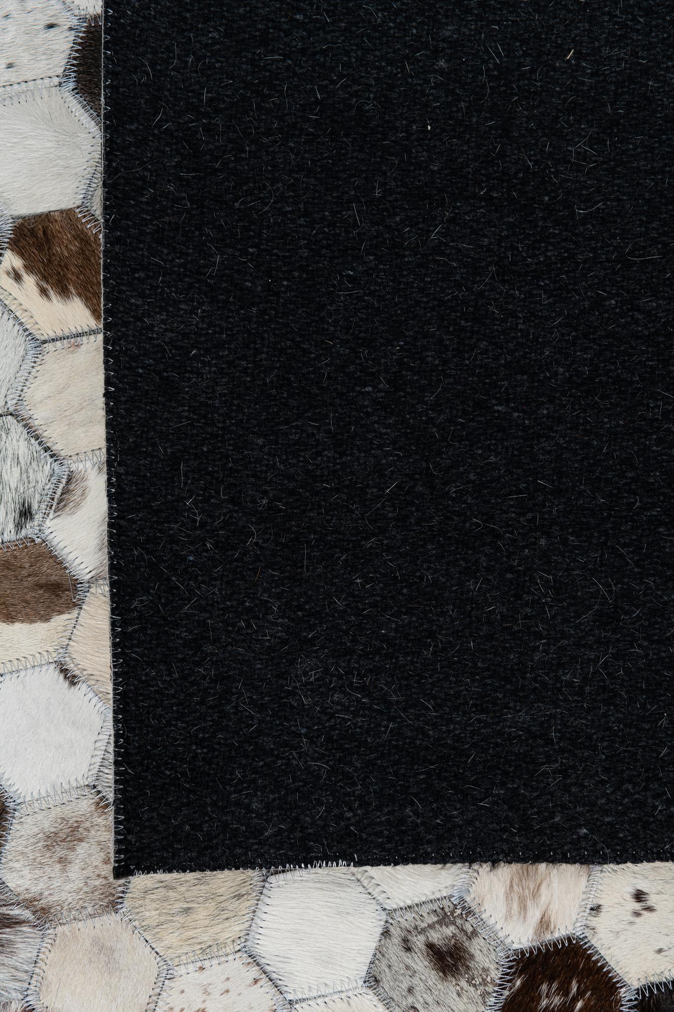 5' 2 x 7' 10 Cowhide Leather Rug