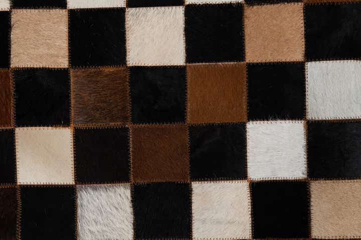 5' 1 x 7' 10 Cowhide Leather Rug