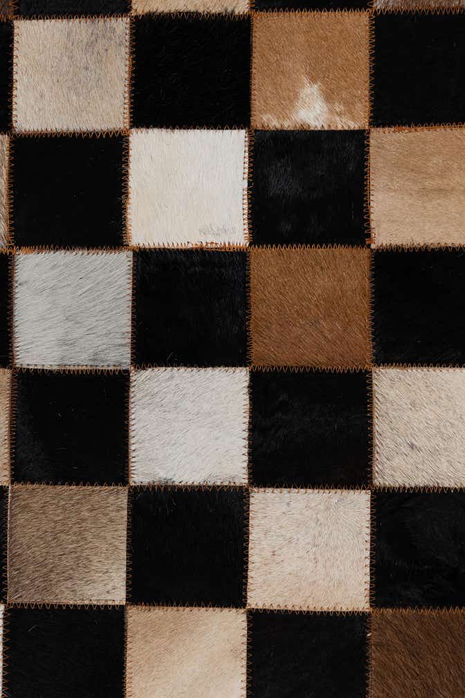 5' 1 x 7' 10 Cowhide Leather Rug