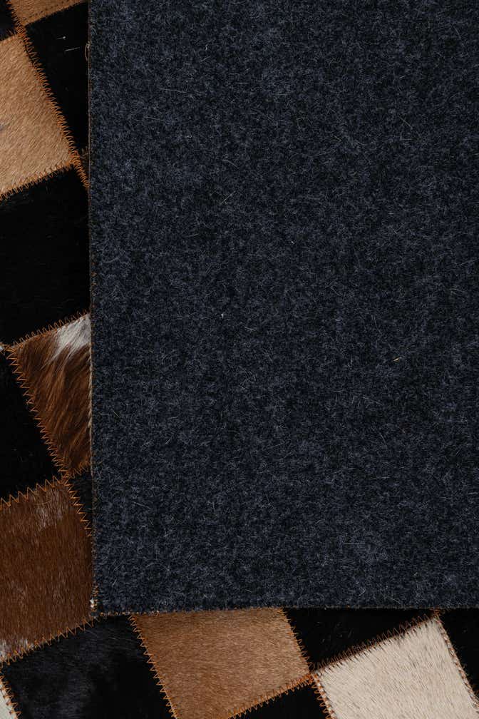 5' 1 x 7' 10 Cowhide Leather Rug