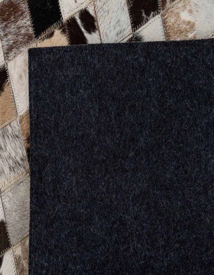 Detail image of 5' x 7' 10 Cowhide Leather Rug