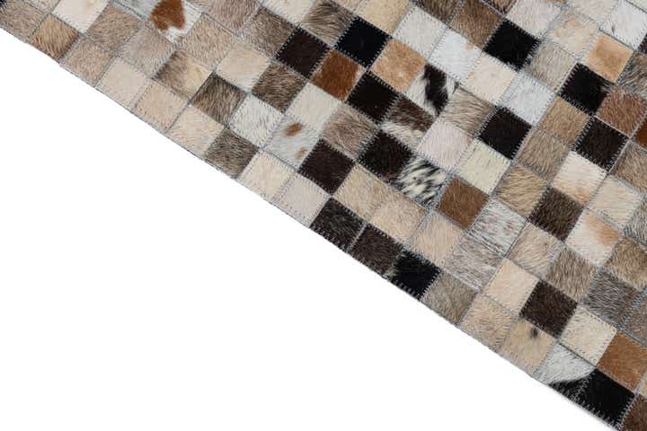 5' x 7' 9 Cowhide Leather Rug