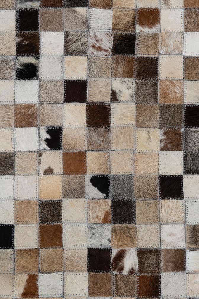 5' x 7' 9 Cowhide Leather Rug