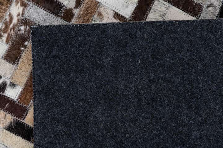 5' 1 x 7' 8 Cowhide Leather Rug