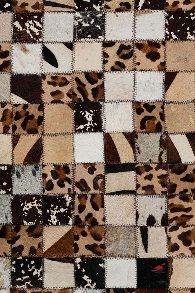 5' 1 x 8' 1 Cowhide Leather Rug