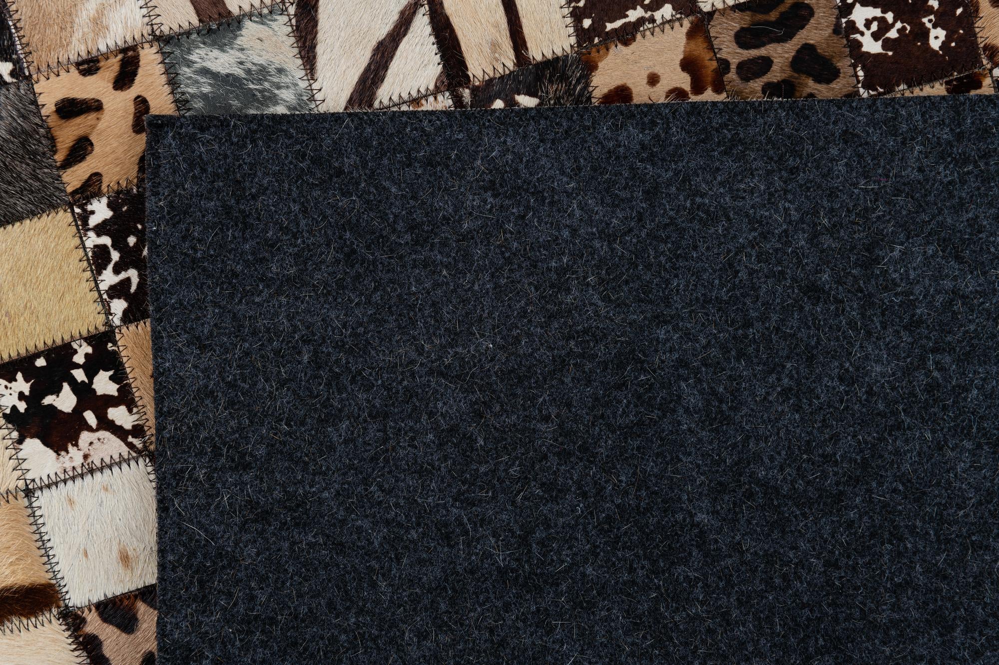 5' 1 x 8' 1 Cowhide Leather Rug