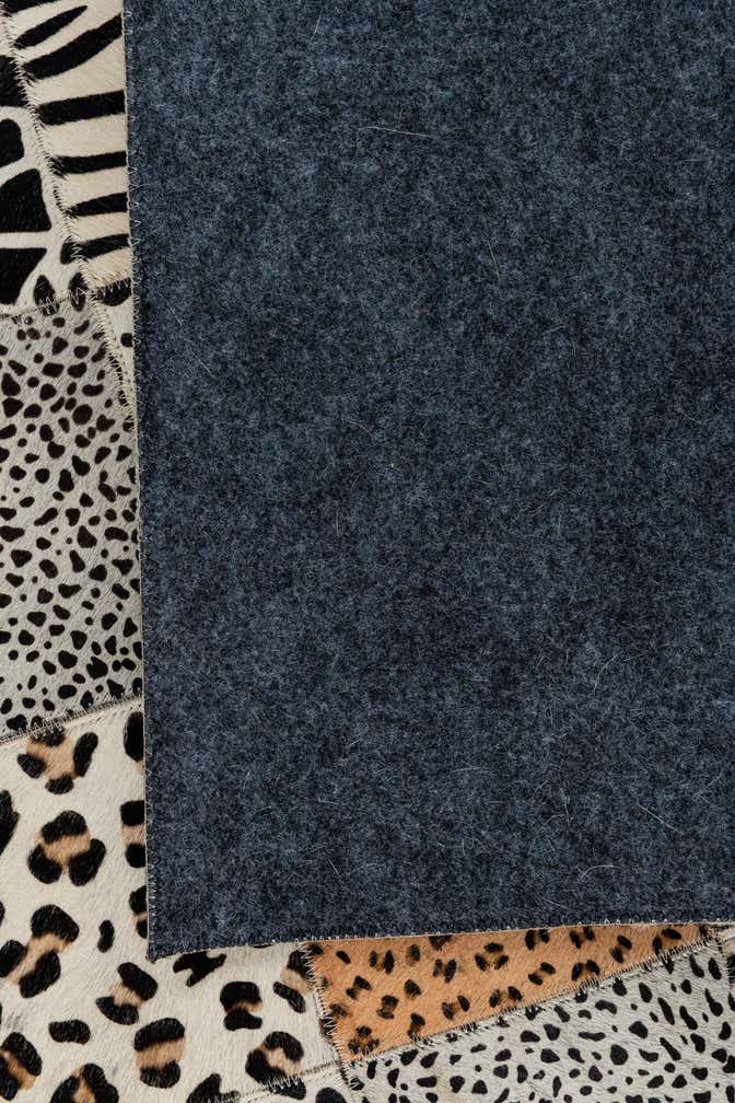 4' 10 x 7' 8 Cowhide Leather Rug