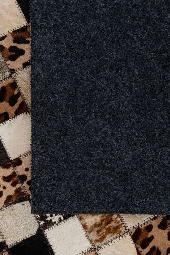5' 1 x 8' 1 Cowhide Leather Rug