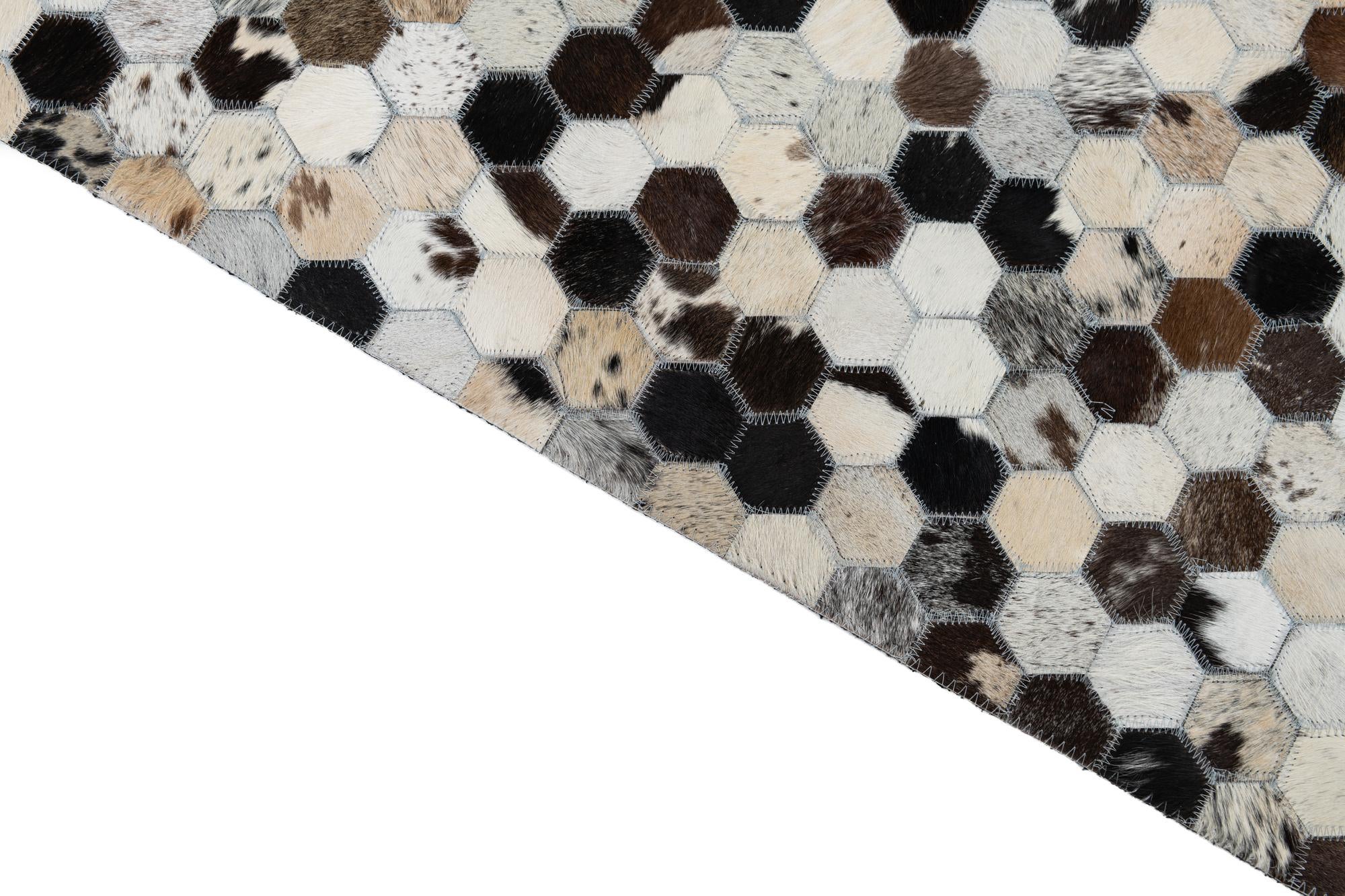 5' 1 x 8' 1 Cowhide Leather Rug
