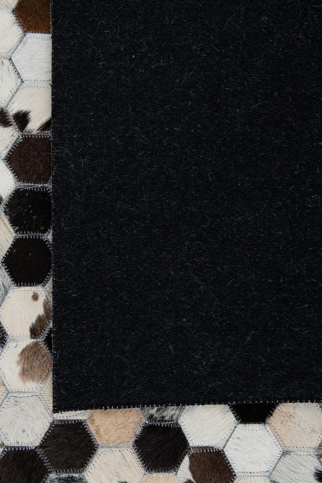 5' 1 x 8' 1 Cowhide Leather Rug