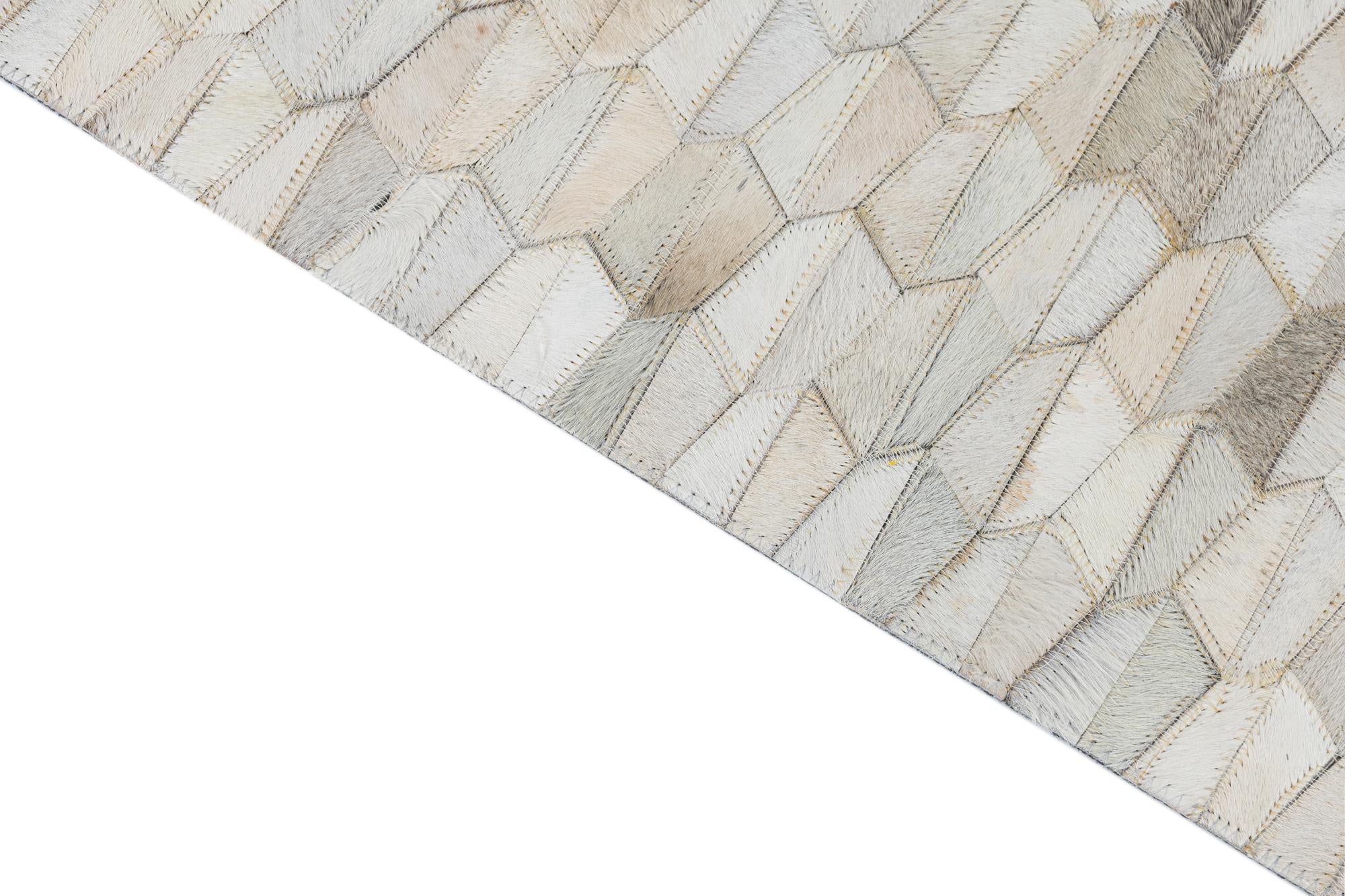 5' 3 x 7' 10 Cowhide Leather Rug