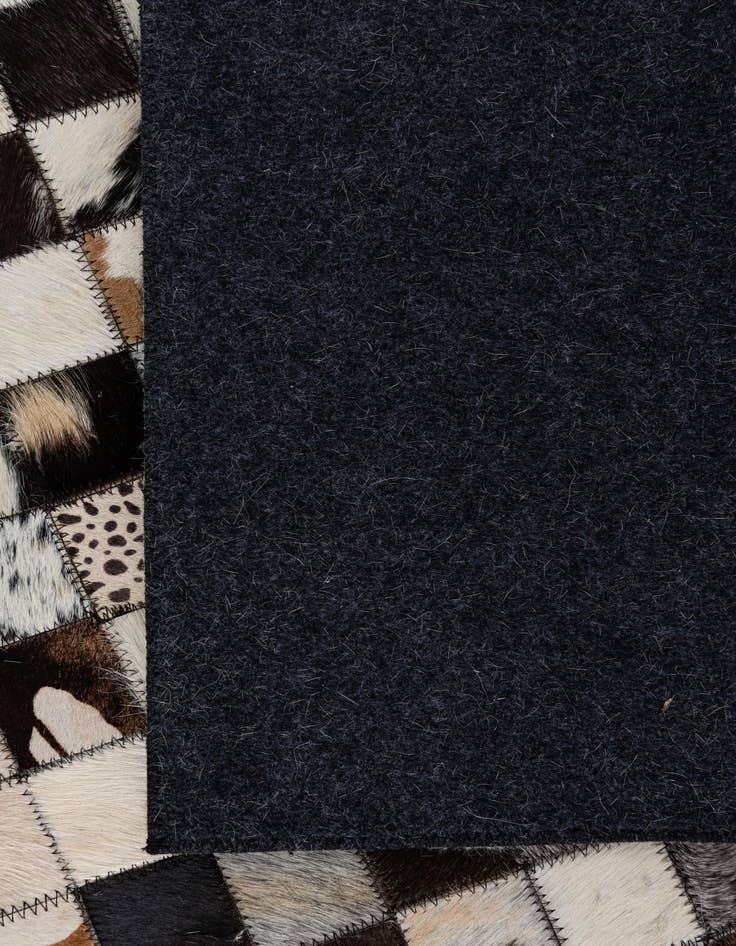 Detail image of 5' 1 x 8' Cowhide Leather Rug