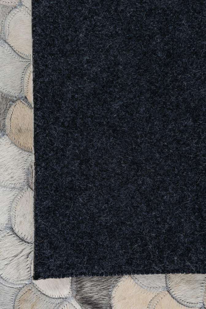 5' 1 x 7' 10 Cowhide Leather Rug