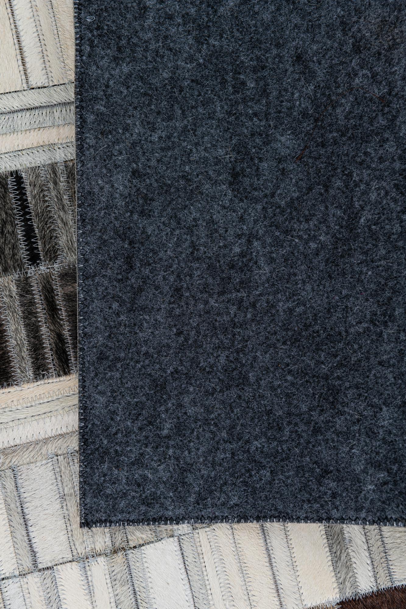 5' 2 x 7' 9 Cowhide Leather Rug