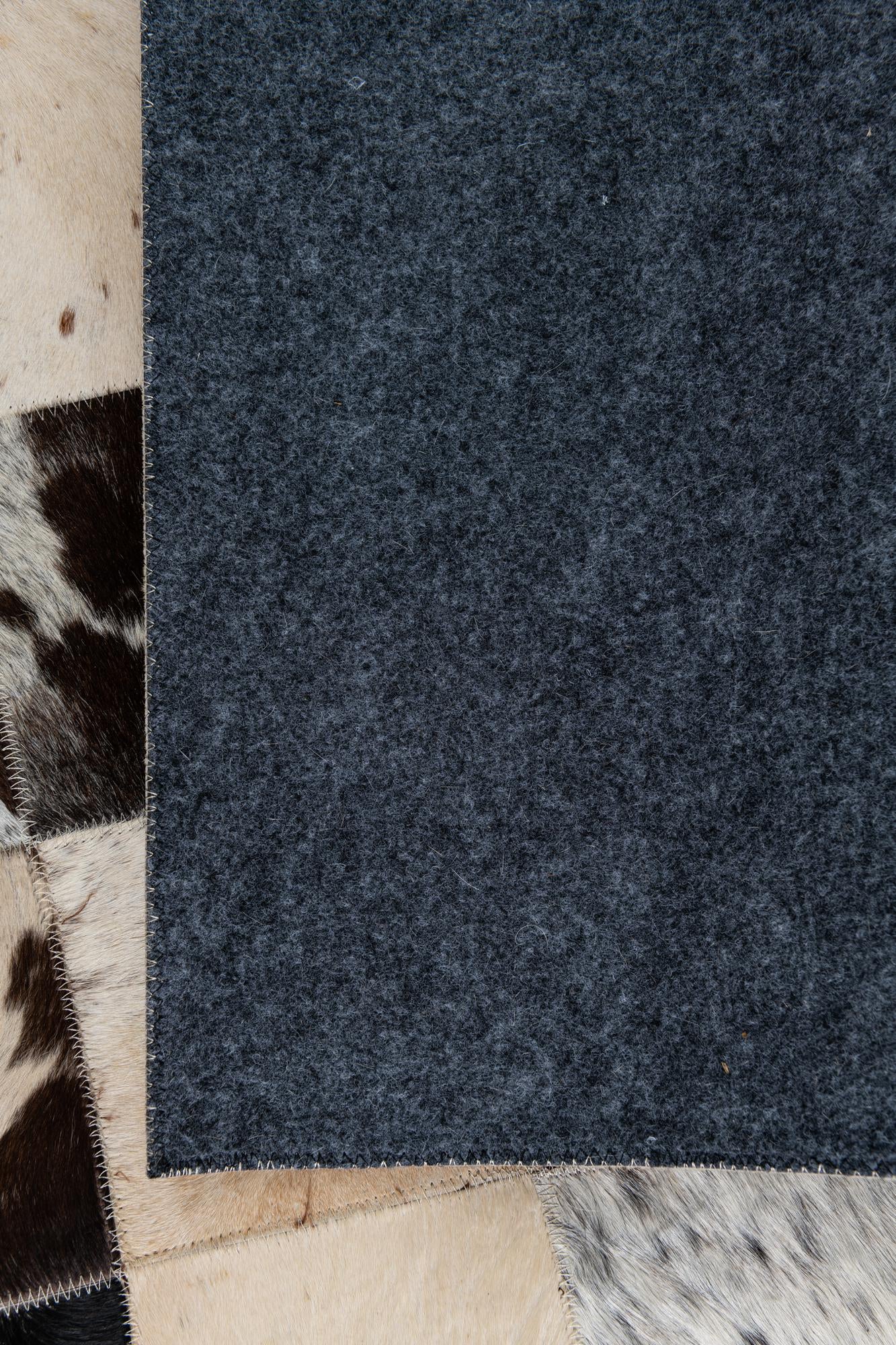 5' x 7' 9 Cowhide Leather Rug