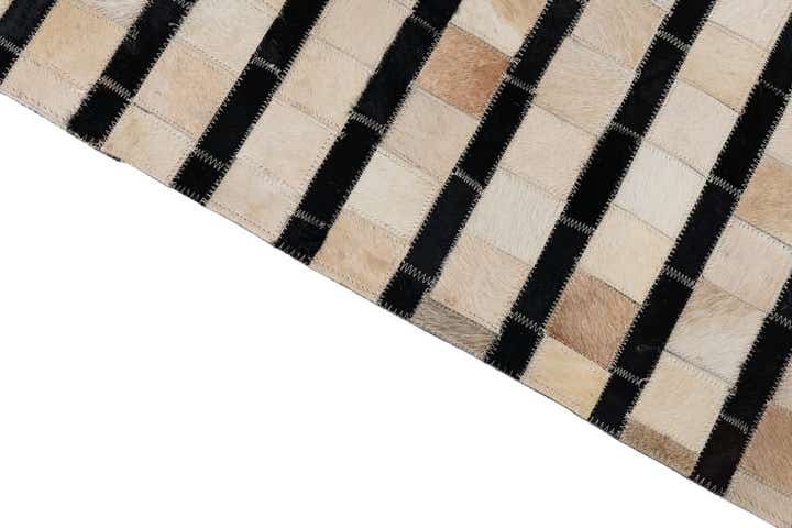 5' 1 x 7' 10 Cowhide Leather Rug