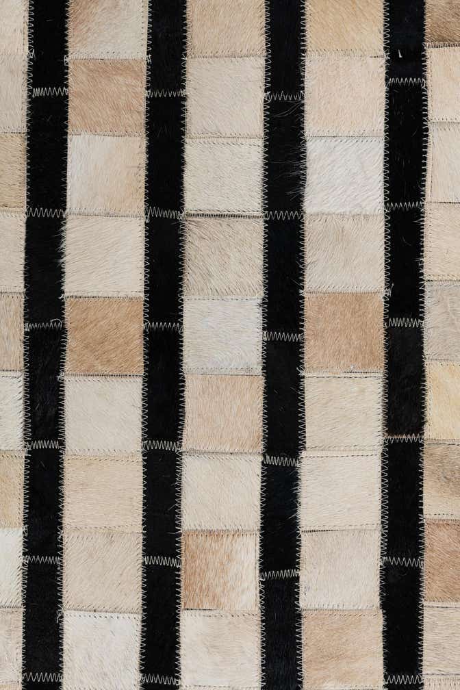 5' 1 x 7' 10 Cowhide Leather Rug