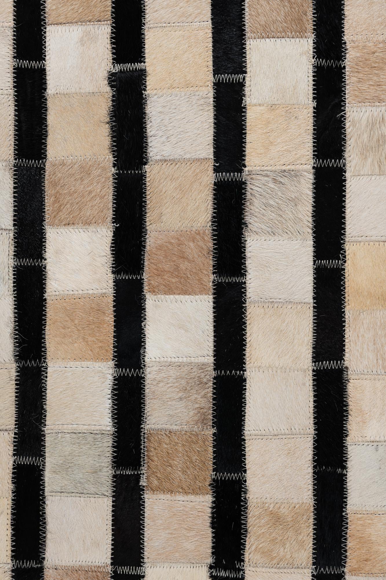 5' 1 x 7' 10 Cowhide Leather Rug
