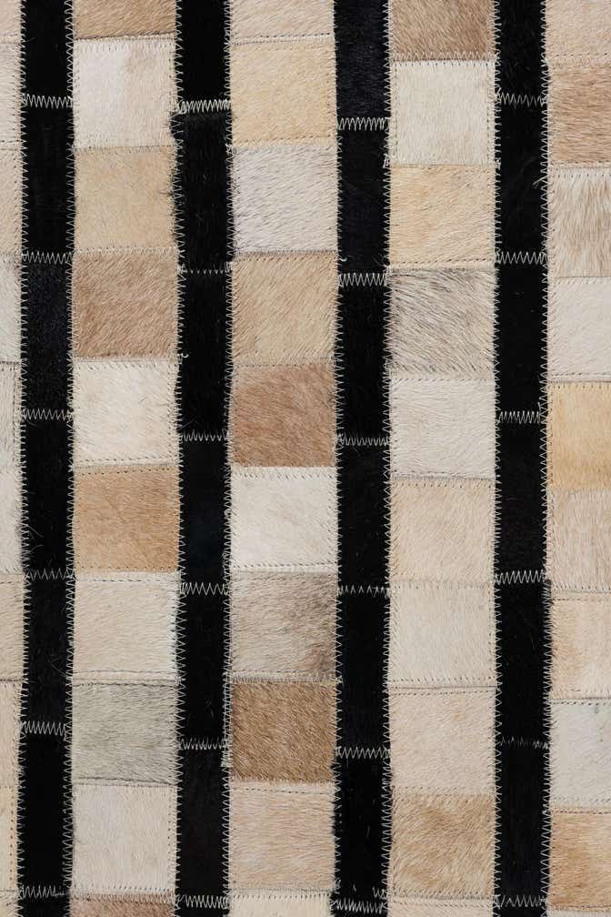 5' 1 x 7' 10 Cowhide Leather Rug