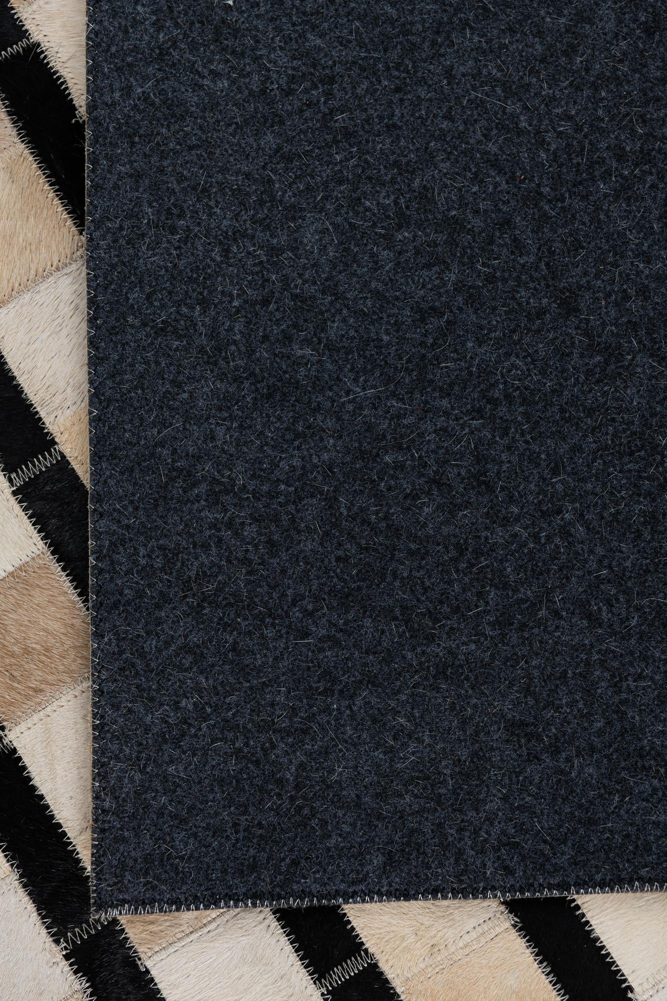 5' 1 x 7' 10 Cowhide Leather Rug