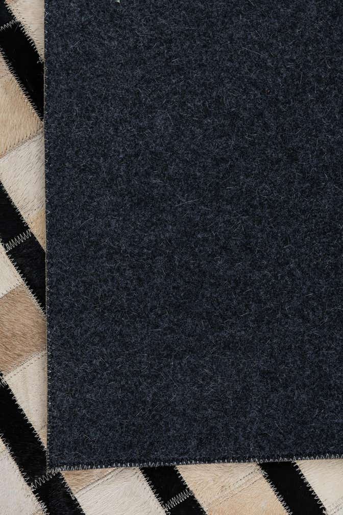 5' 1 x 7' 10 Cowhide Leather Rug